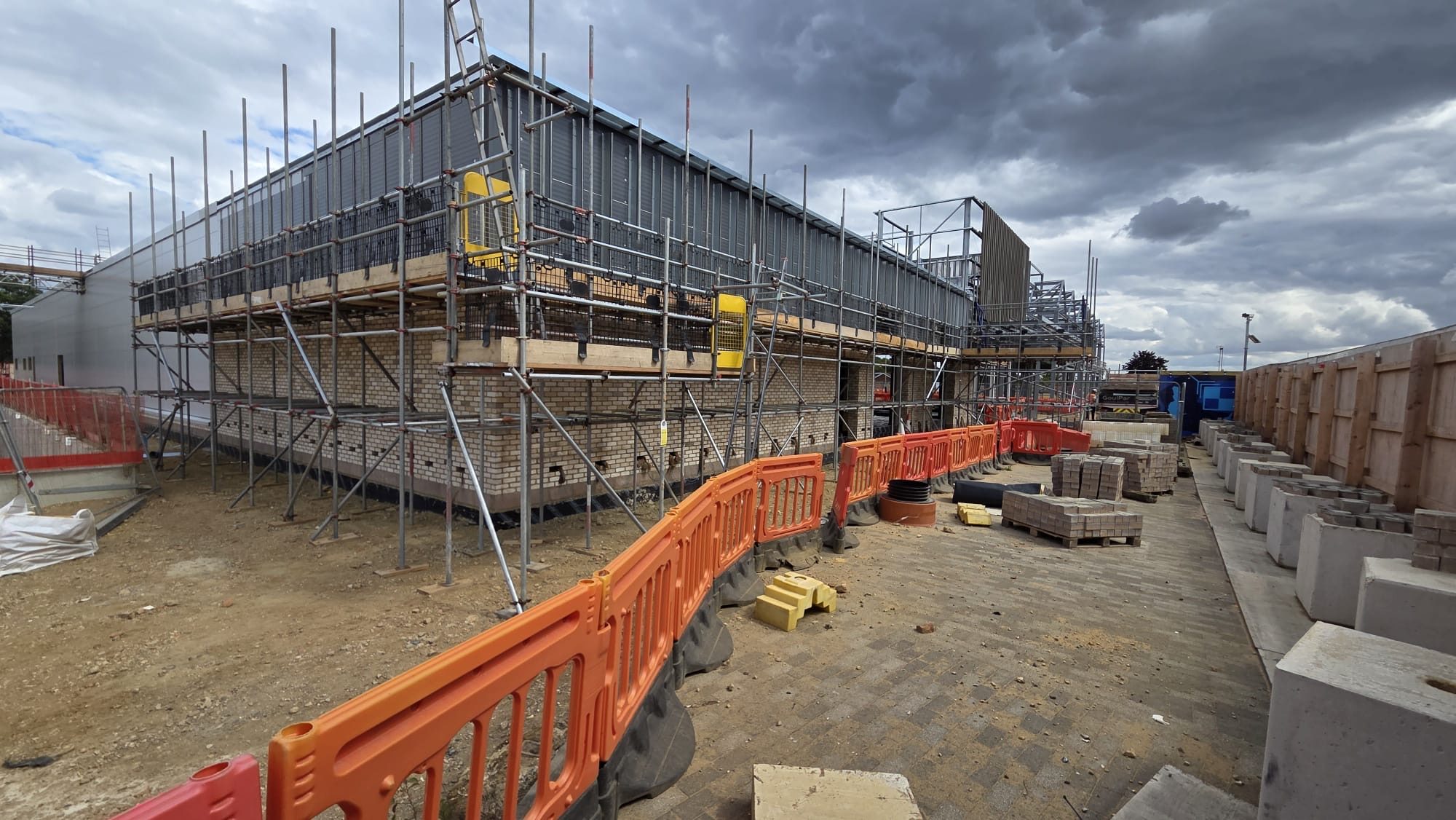 Brickwork and scaffolding progress at the Sainsbury's shopping centre for Mildren Homes