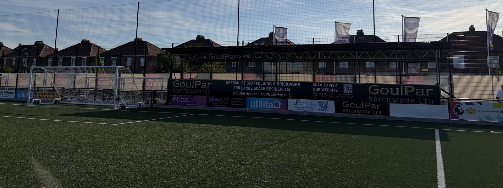 New Moneyfields FC stand at the John Jenkins Stadium with GoulPar branding